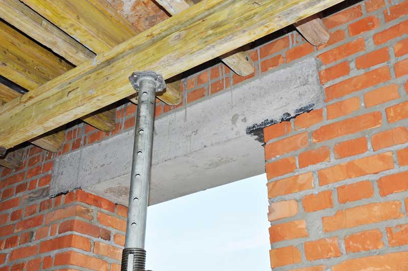 A lintel is a beam installed above your doors and windows which works to transfer some of the weight above them to the surrounding walls.