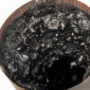 black, tarry creosote in a pipe