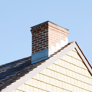 masonry chimney against a blue sky